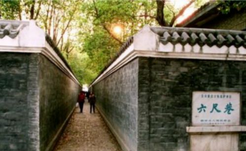 千里家書只為墻,讓人三分又何妨